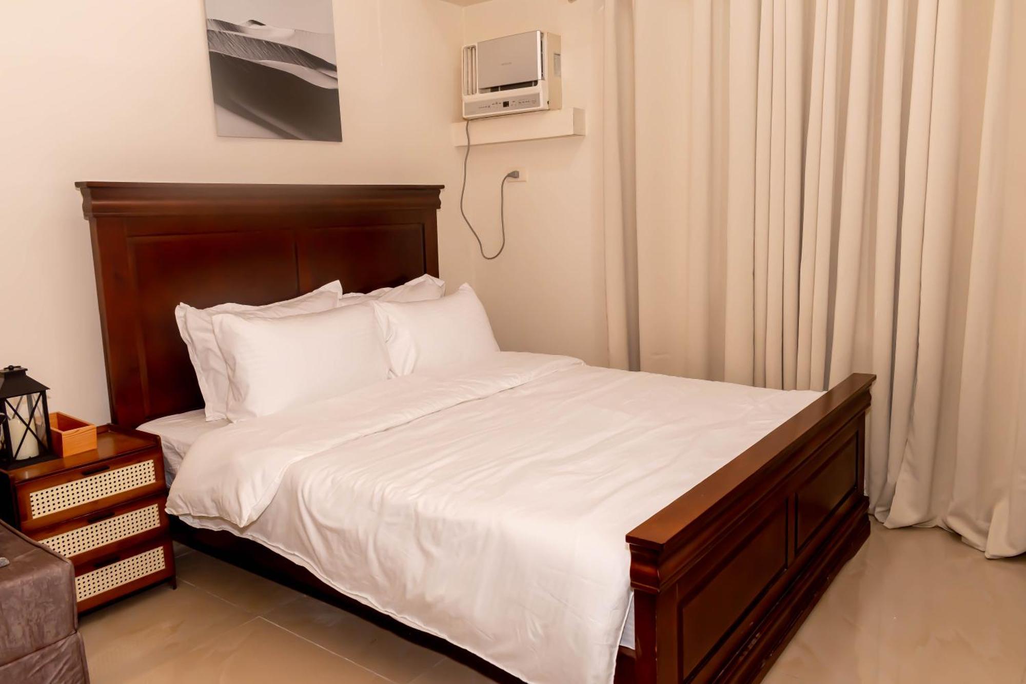 Amora Suites At The Beacon Makati Manille Chambre photo