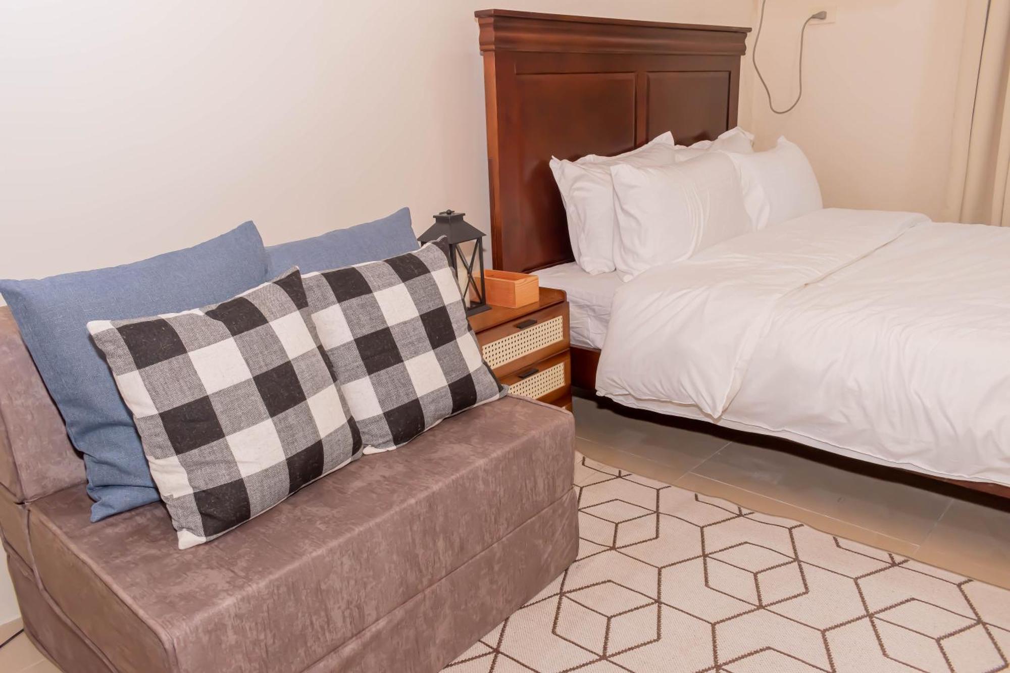 Amora Suites At The Beacon Makati Manille Chambre photo